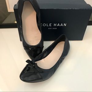 COLE HAAN leather ballet flats with bow detail.